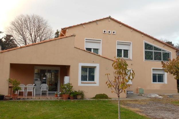Agrandissement et rénovation d'un appartement. Aménagement de combles.