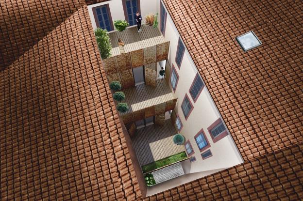 Restructuration de la cour où l'intervention contemporaine met en valeur et s'ha