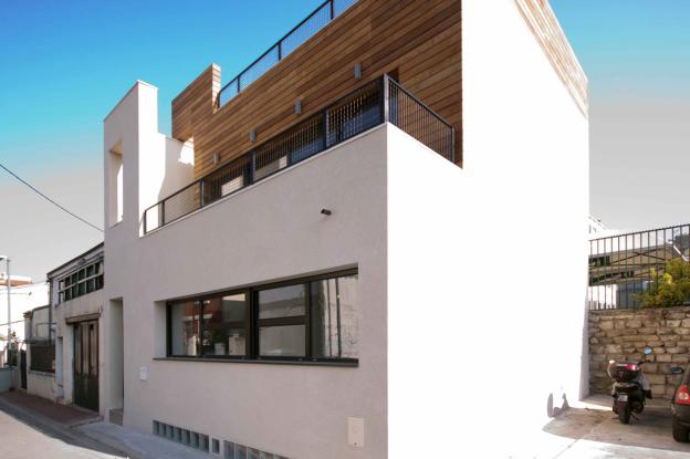 Maison de style industriel - bardage bois