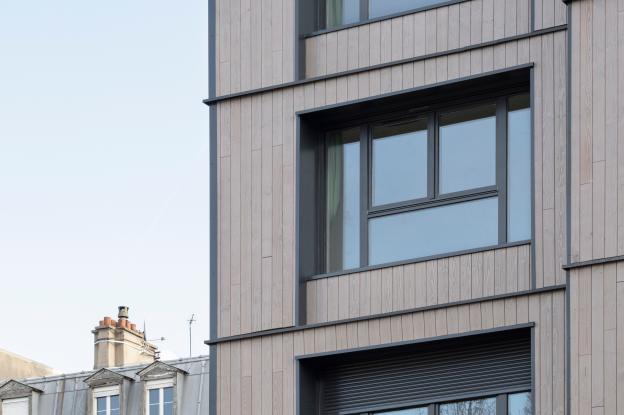 La Chapelle // Façade est en ossature bois (FOB) avec remplissage en textile recyclé (Métisse®) sur ossature béton