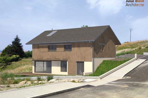 la maison s'intègre dans son terrain en pente