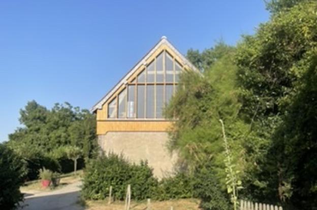 grange transformée en maison - pignon vitrée