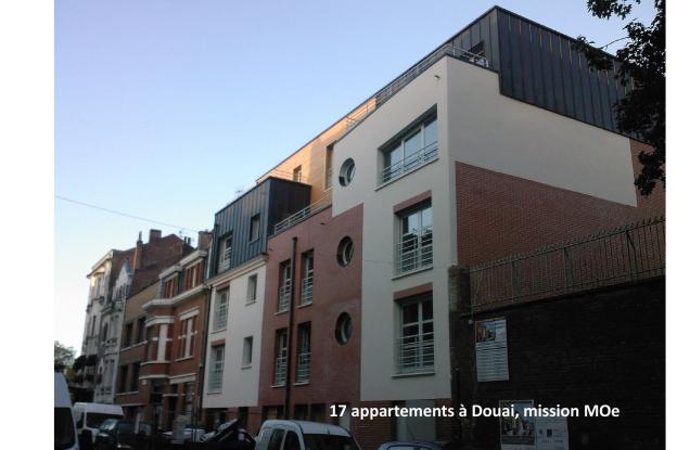 Immeuble de 14 logements et 1 bureau à Dou