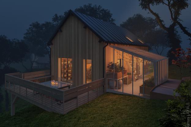 La maison, sa serre et sa terrasse le soir