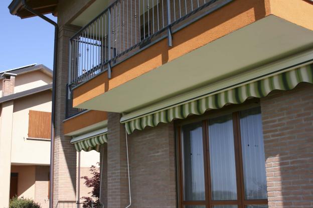 Façade arrière et jardin, maison jumelée en brique apparente
