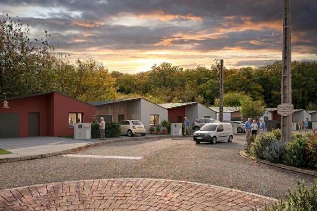 Vue d’ensemble depuis la rue d’un projet de logements seniors en maisons de plain-pied à Théding en Moselle
