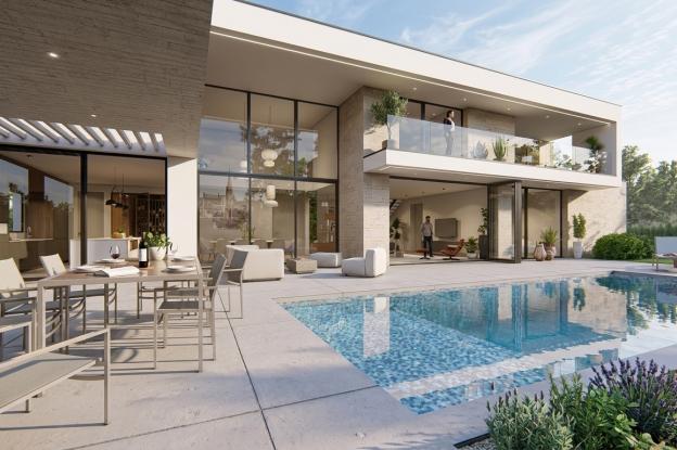 Vue arrière d’une maison contemporaine depuis le poolhouse avec piscine et grandes baies vitrées à Marly en Moselle