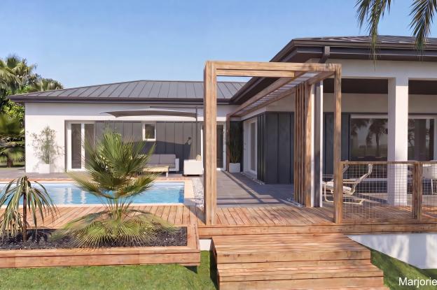 Modernisation des façades (bardage métallique sombre, rampes d'éclairage, et brise-soleil métalliques), décor en bois de connexion au jardin (marches et portique d'accès, jardinières filantes et garde-corps en filet)