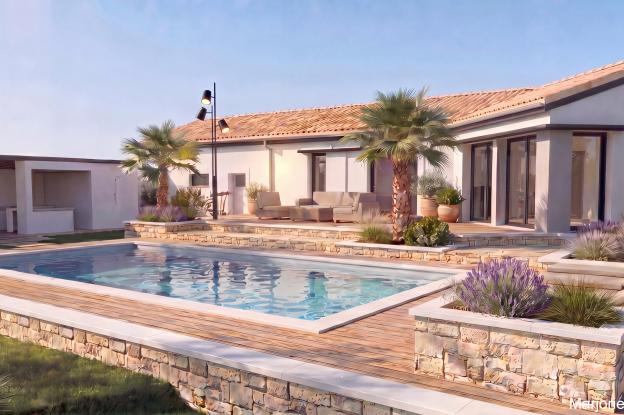 Maison contemporaine avec jeu de volumes blancs, murettes en pierre locale, piscine, jardinières végétalisées et poolhouse. 