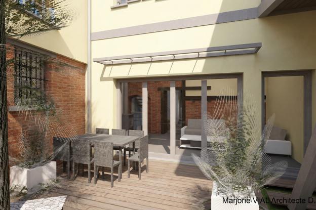 Patio créé dans le tissu historique