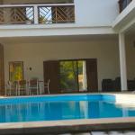 villa_isle_facade_arriere_piscine_1.jpg