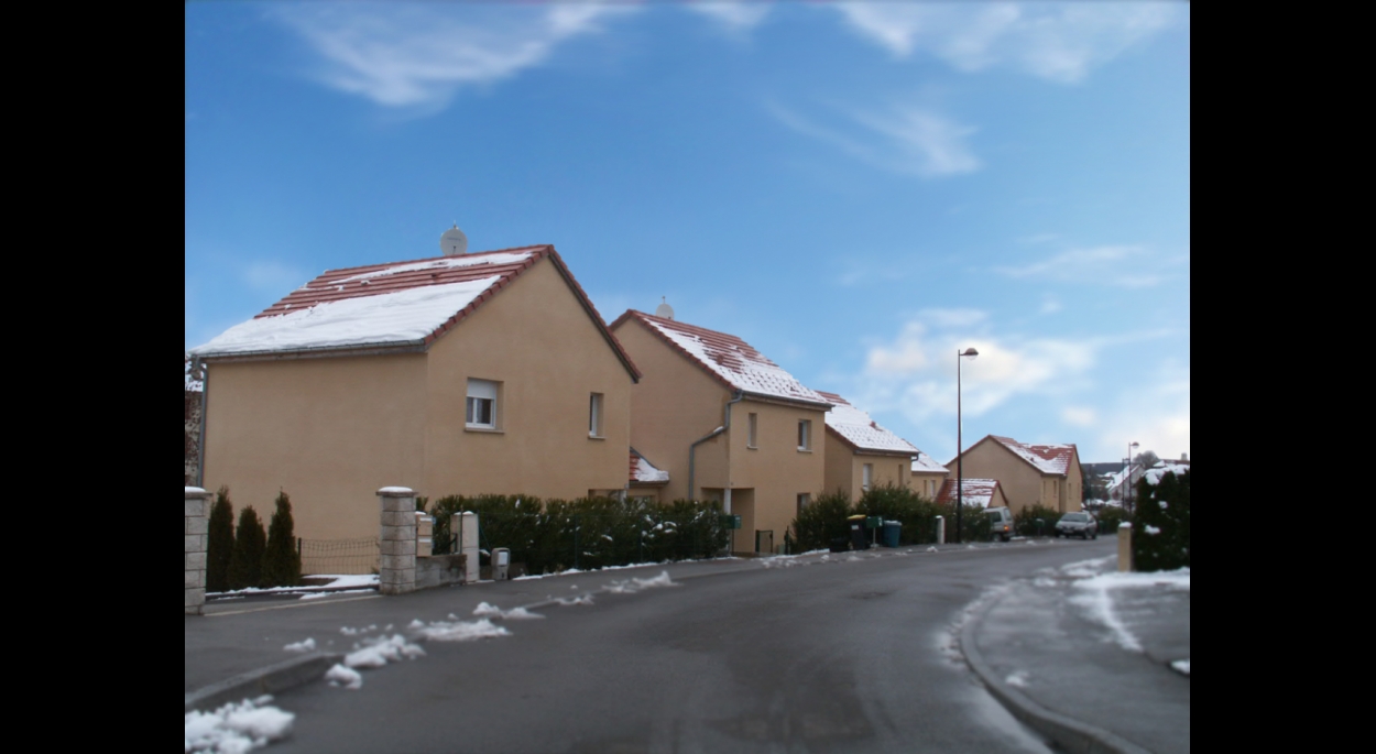 Ensemble de maisons individuelles groupées formant une rue